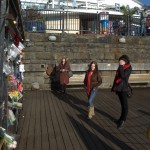 Tourists view tributes to Ianto Jones outside the Torchwood Hub