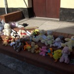 Cuddly toys and notes left by locals in memory of the baby boy
